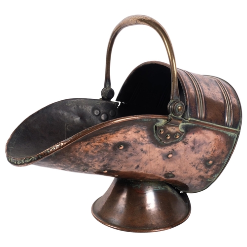 330 - A Victorian copper coal scuttle, with banded decoration, L43cm