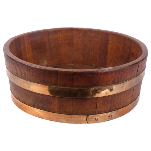 343 - A coopered oak half barrel/jardiniere stand, diameter 45cm, height 16cm