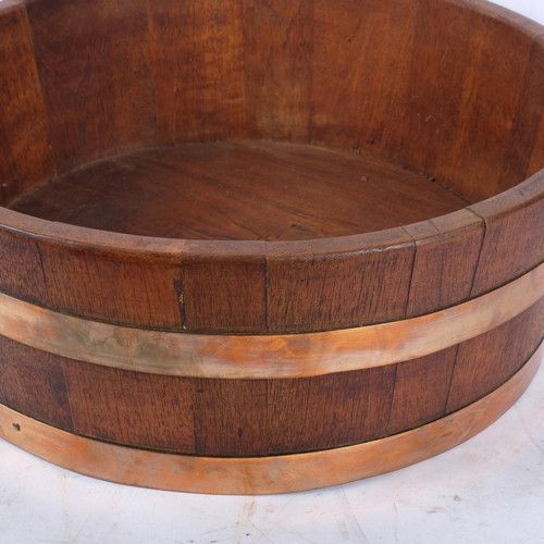 343 - A coopered oak half barrel/jardiniere stand, diameter 45cm, height 16cm