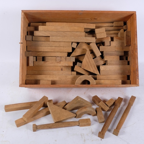 351 - A box of wooden building blocks