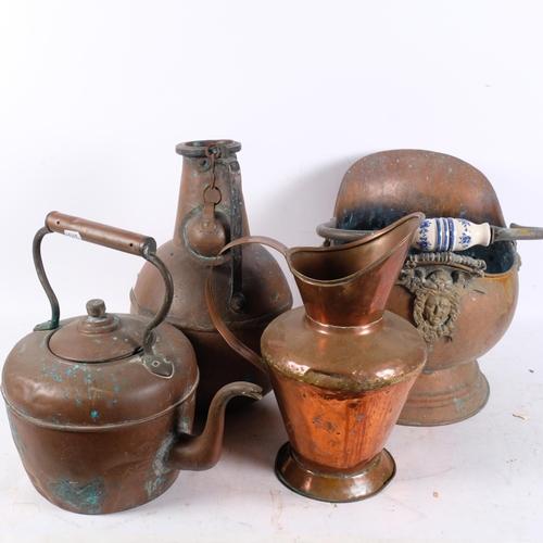 353 - A Continental copper coal scuttle with ceramic handle, 2 copper jugs, and a copper kettle