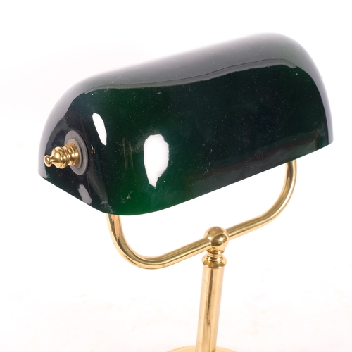 356 - An adjustable brass desk lamp, with black shade, H35.5cm