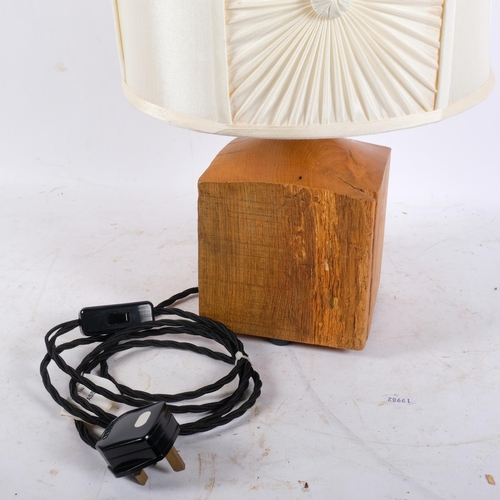 358 - A carved oak table lamp with oakleaf motif, and shade, H42cm overall