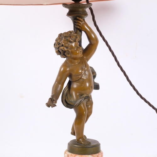 359 - A brass cherub figure table lamp on marble plinth and 4 feet, with shade, H63cm overall