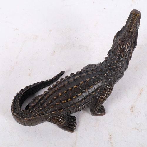 360 - A cast-bronze study of a crocodile, L24cm