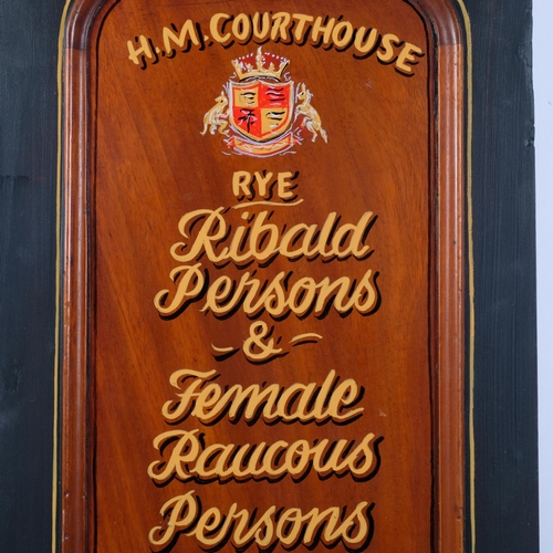 399 - A carved and painted rectangular sign, H.M. Courthouse, Rye, 