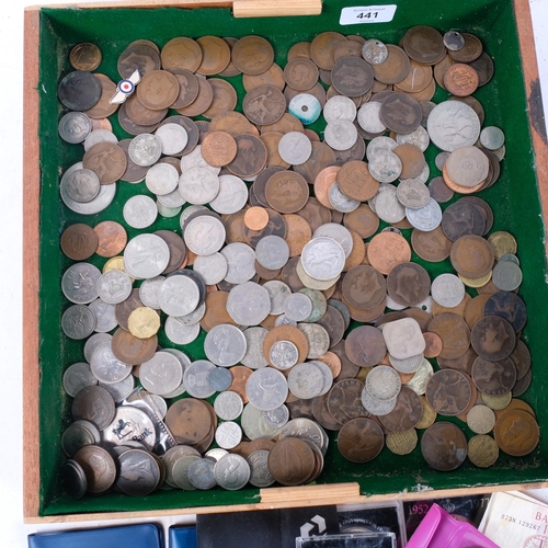 441 - A quantity of British coins and several world banknotes