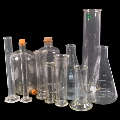 462 - A group of Vintage scientific laboratory glass cylinder and conical measuring flasks, largest 46cm