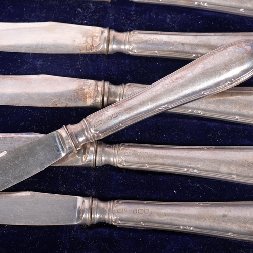 475 - A cased set of 6 silver-handled butter knives, Allen & Darwin, Sheffield 1914, overall 17.5cm