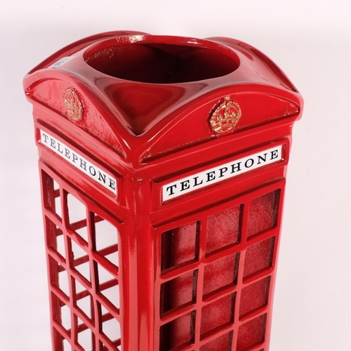 823 - A painted cast-iron telephone box, H57cm