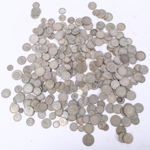 695 - A large quantity of pre-1947 British silver coins (85oz)