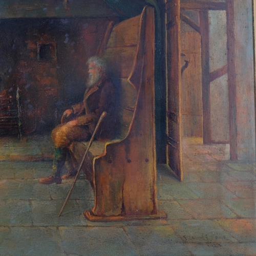 816 - Oil on board, genre scene, figure seated by the fire, signed and dated 1928, 48cm x 66cm