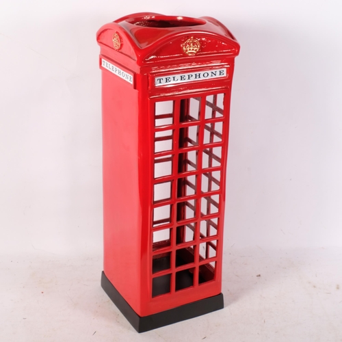 823 - A painted cast-iron telephone box, H57cm