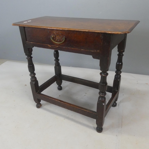 2471 - A Georgian oak side / hall table with single drawer and all around stretcher. Width 77cm, height 70c... 