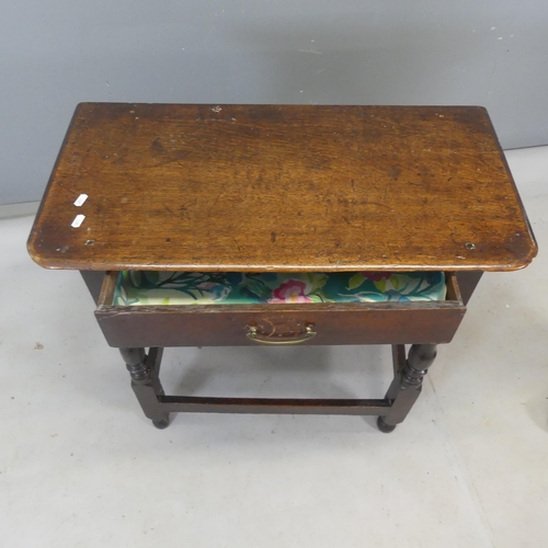 2471 - A Georgian oak side / hall table with single drawer and all around stretcher. Width 77cm, height 70c... 