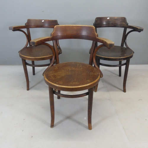 2472 - A pair of Thonet bentwood elbow chairs, and another similar.