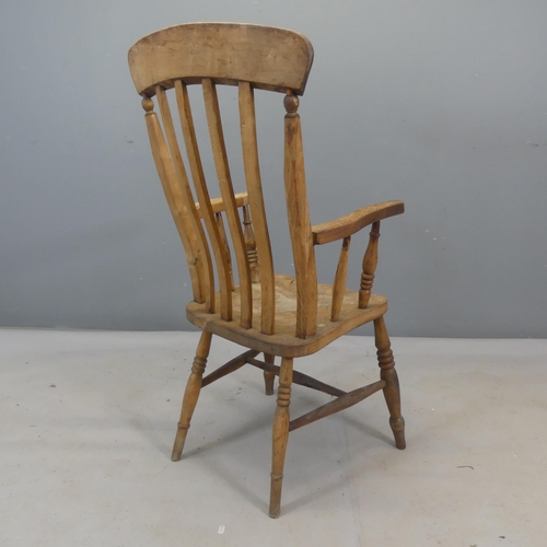 2473 - A stick-back elm-seated Windsor kitchen chair.