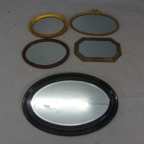 2489 - Five various wall mirrors, to include an octagonal repousse brass framed example.