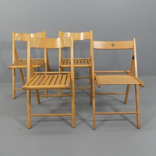 2492 - A set of three folding chairs, and another similar. (4)