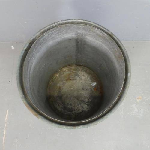 2501 - A cylindrical zinc lined copper two-handled planter. Diameter 
49cm, height 54cm.