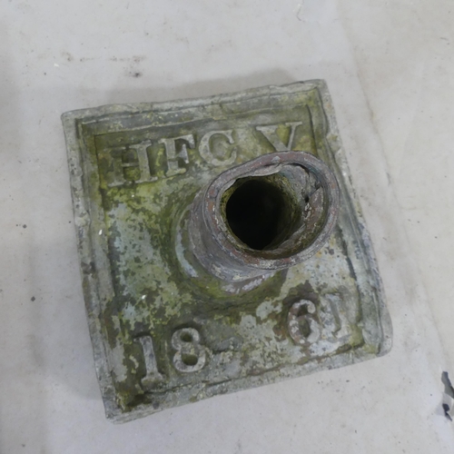 2502 - An antique lead waterspout marked HFC V 1861, and an aluminium bracket.