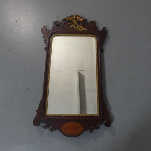 2512 - A Georgian mahogany wall mirror. Width 51cm, height 91cm.