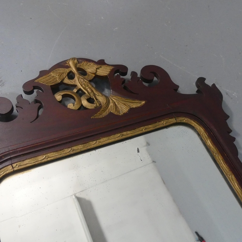 2512 - A Georgian mahogany wall mirror. Width 51cm, height 91cm.