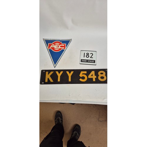 426 - A registration number plate, various bus number plates, Fair Stage signs, etc