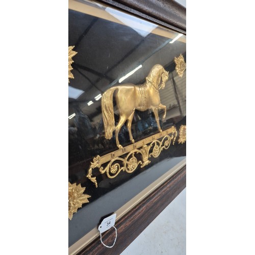 34 - A 19th century gilt-bronze relief Ducrow circus horse, with floral bosses, oak-framed and glazed, 59... 