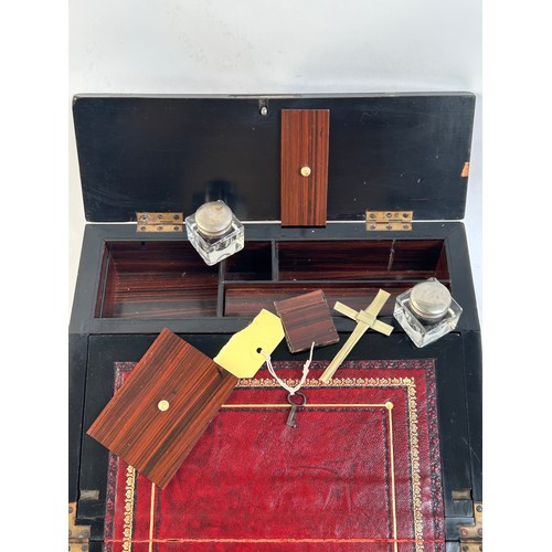 6 - An Antique Victorian inlaid mahogany and burr-walnut travelling writing slope, with inlaid wirework ... 