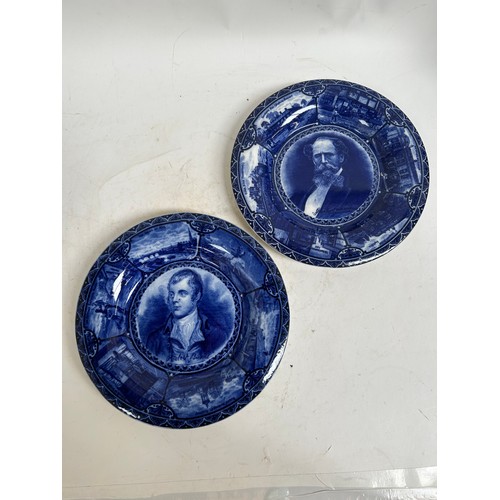 256 - A pair of Staffordshire portrait plaques, depicting Burns and Dickens, and a Japanese blue and white... 