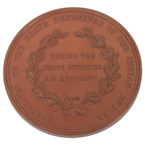 15 - A bronze commemorative medal for the Indian Sepoy Mutinies, struck 1857 by John Pinches, London, 63m... 