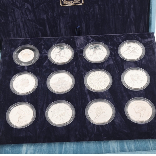 24 - A set of 12 silver proof 1986 Commonwealth Games commemorative coins, in presentation box