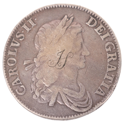 61 - A Charles II 1662 silver Crown, engraved JS to both sides, 39.5mm, 29.5g