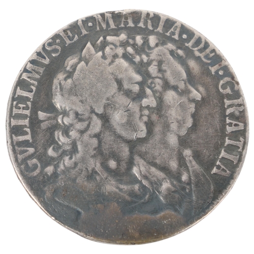 87 - A William & Mary 1689 silver Crown, with memorial inscription dated 1822, 33mm, 14.7g