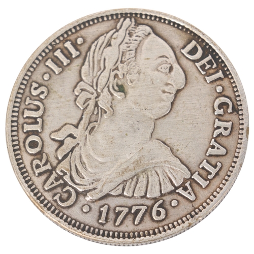 90 - **WITHDRAWN**A Carlos III Spainish 8 Reales 1776 silver coin,  Mexico mint, 39mm, 25.8g