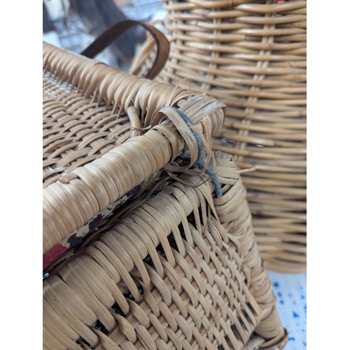 2493 - A campaign style wicker folding chair with integrated compartment with lifting lid.