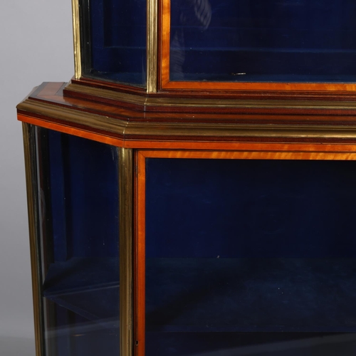 512 - A Victorian satinwood mahogany and brass-edge display cabinet, with canted corners and turned feet, ... 