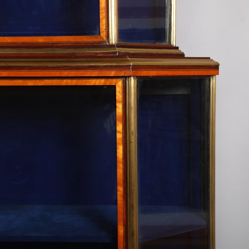 512 - A Victorian satinwood mahogany and brass-edge display cabinet, with canted corners and turned feet, ... 