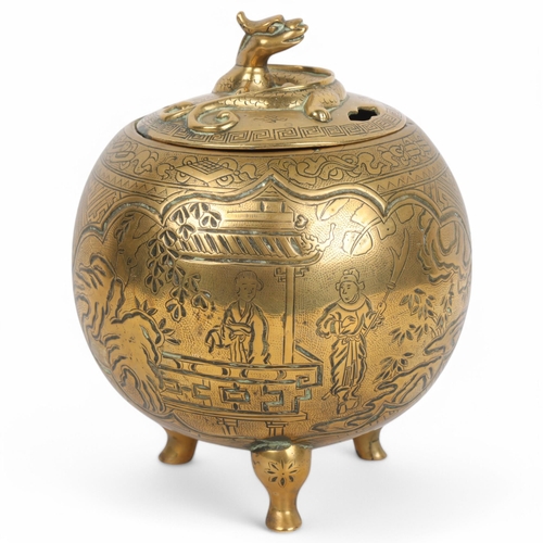 404 - A Chinese brass incense burner and cover, with engraved decoration and dragon mounted lid, height 19... 