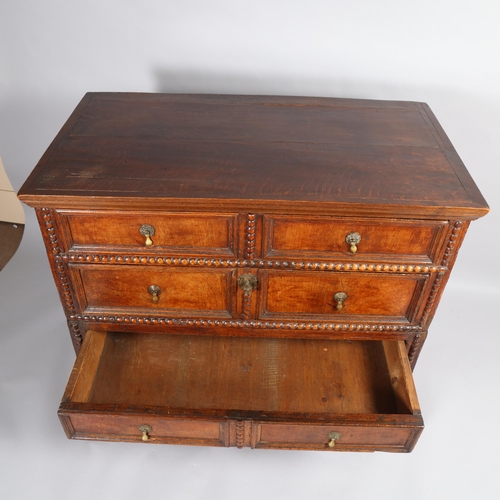 500 - An 18th century oak and walnut chest of drawers, in 2 parts, with moulded panelled drawer fronts and... 