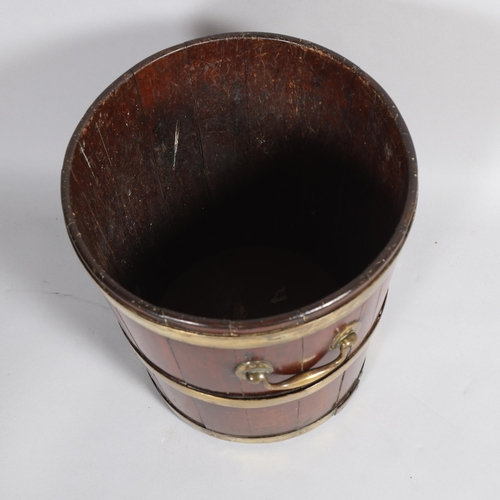 501 - A 19th century brass-bound mahogany peat bucket, with brass carrying handles, height 41cm, diameter ... 