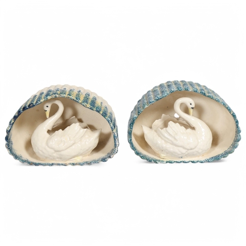 505 - A pair of Staffordshire pearlware pottery swan design wall pockets, circa 1920, width 15cm