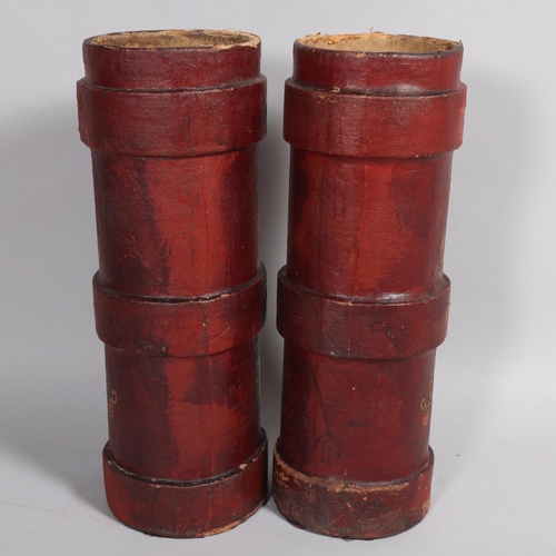 506 - A pair of 19th century canvas-covered Cordite buckets with armorial crests, height 50cm