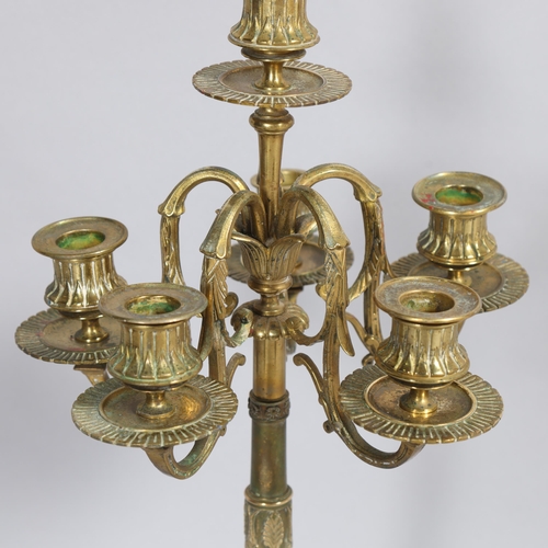 508 - A Neo-Classical style brass 5-branch table candelabrum on cast griffon design base, height 61cm