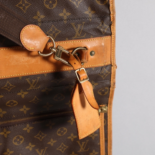 509 - LOUIS VUITTON - a Louis Vuitton Monogram suit carrying case, serial no. VX1920, width 60cm