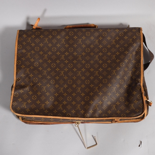 509 - LOUIS VUITTON - a Louis Vuitton Monogram suit carrying case, serial no. VX1920, width 60cm