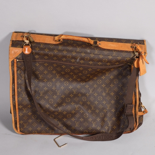 509 - LOUIS VUITTON - a Louis Vuitton Monogram suit carrying case, serial no. VX1920, width 60cm