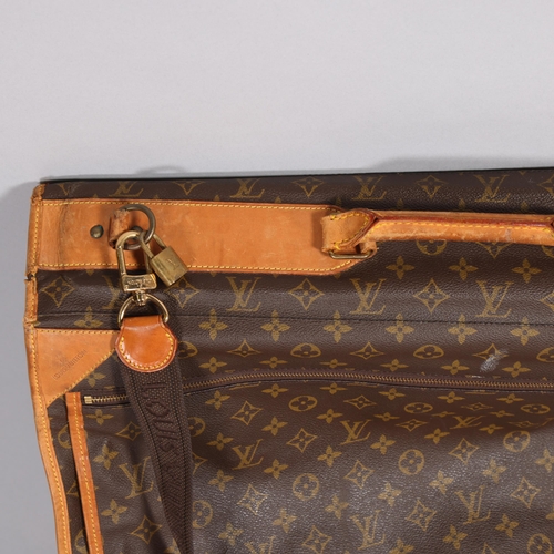 509 - LOUIS VUITTON - a Louis Vuitton Monogram suit carrying case, serial no. VX1920, width 60cm