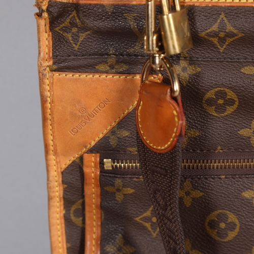 509 - LOUIS VUITTON - a Louis Vuitton Monogram suit carrying case, serial no. VX1920, width 60cm